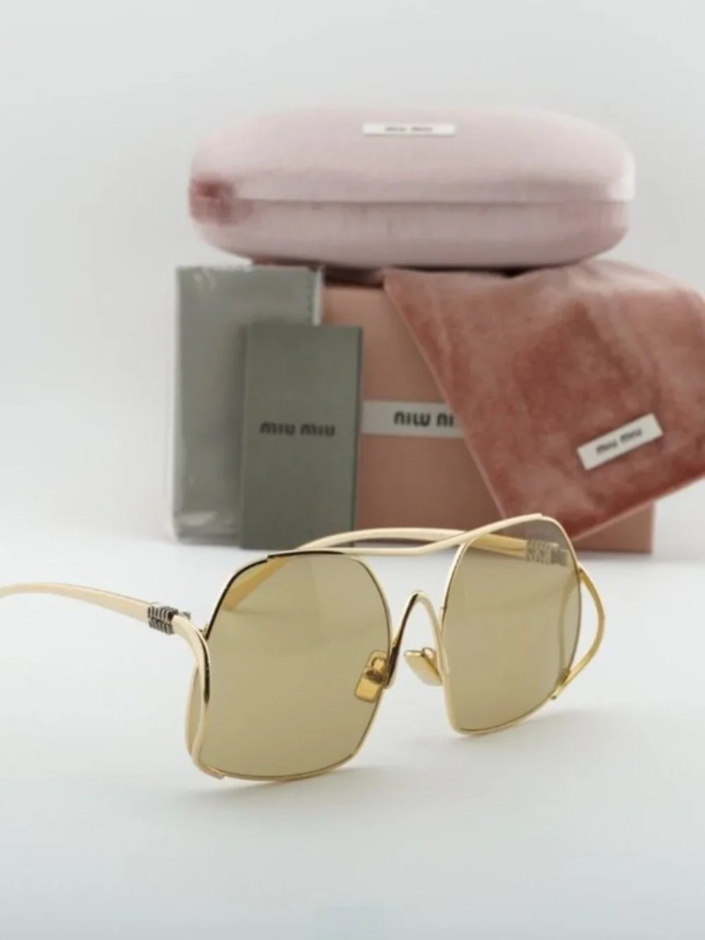 Miu Miu MUA55S 5AK10R Sunglasses Gold Geometric Frame, Yellow Lenses